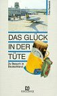 Das Glück in der Tüte. Zu Besuch in Deutschland
