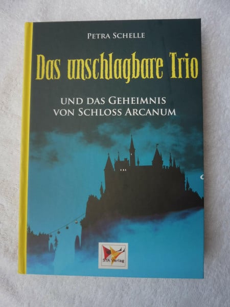 das unschlagbare trio - und das geheimnis von schloss arcanum