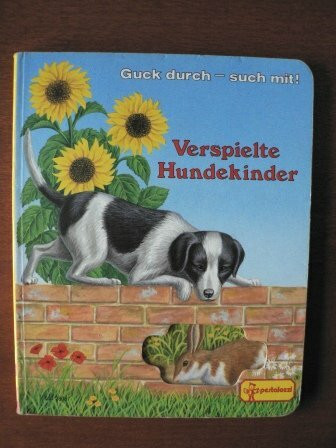 Verspielte Hundekinder. Guck durch - such mit