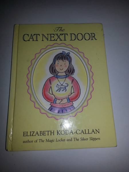 The Cat Next Door (Elizabeth Koda-Callan's Magic Charm Books, 6th)